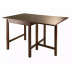 Tavolo da pranzo a ribalta con sedie a pioli, design salvaspazio, legno/noce antico